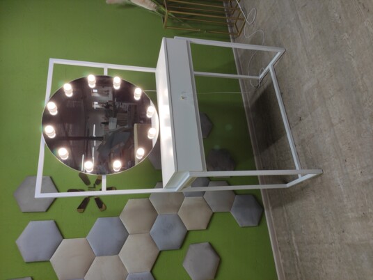 Make-up artist's table with a mirror